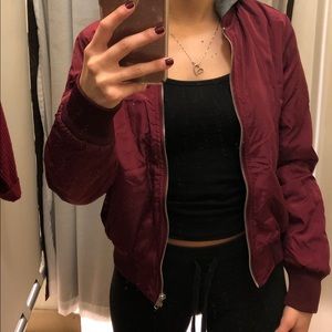 Maroon jacket with gray hood